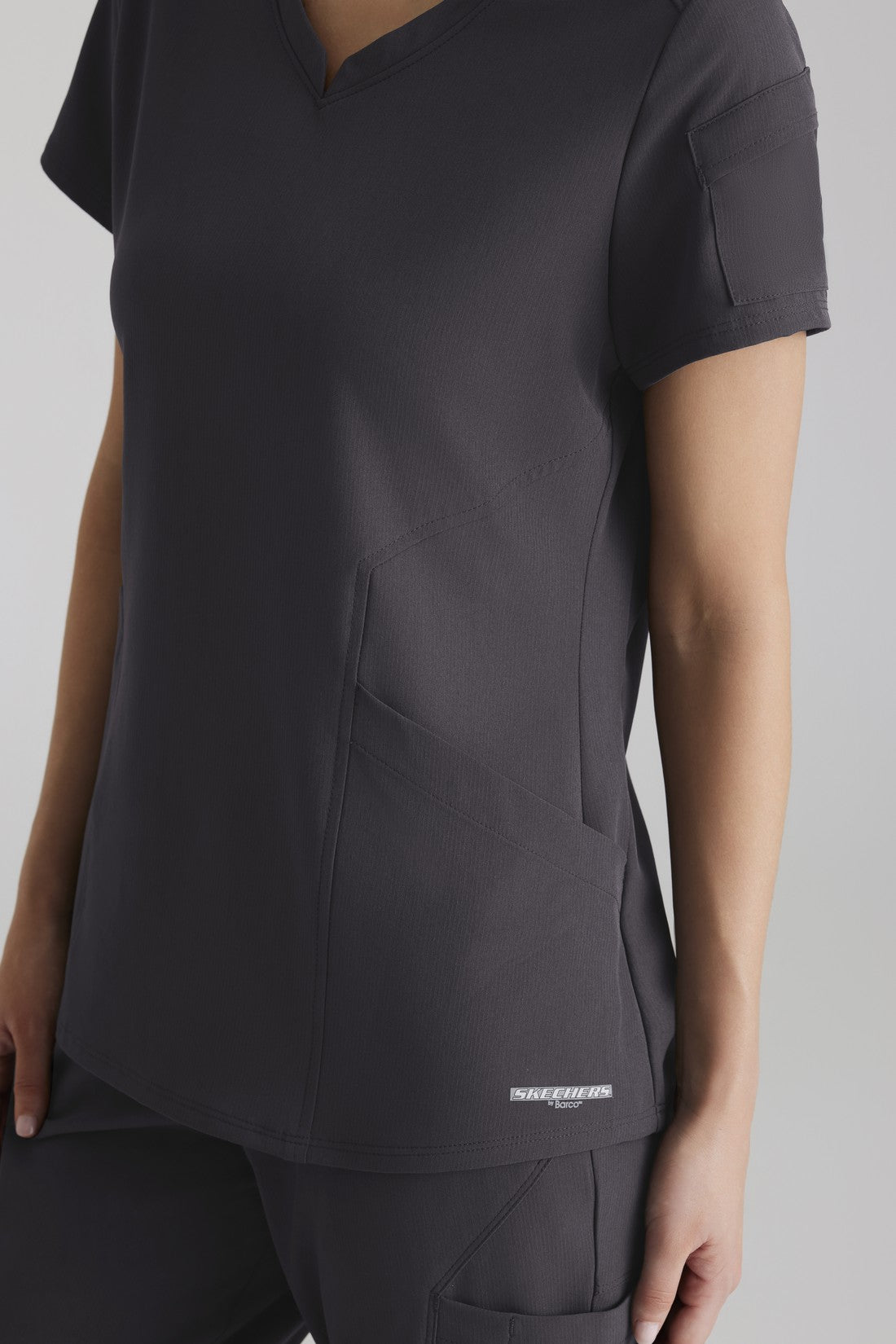 TOP MUJER SKECHERS VITALITY SKT225 - GRIS