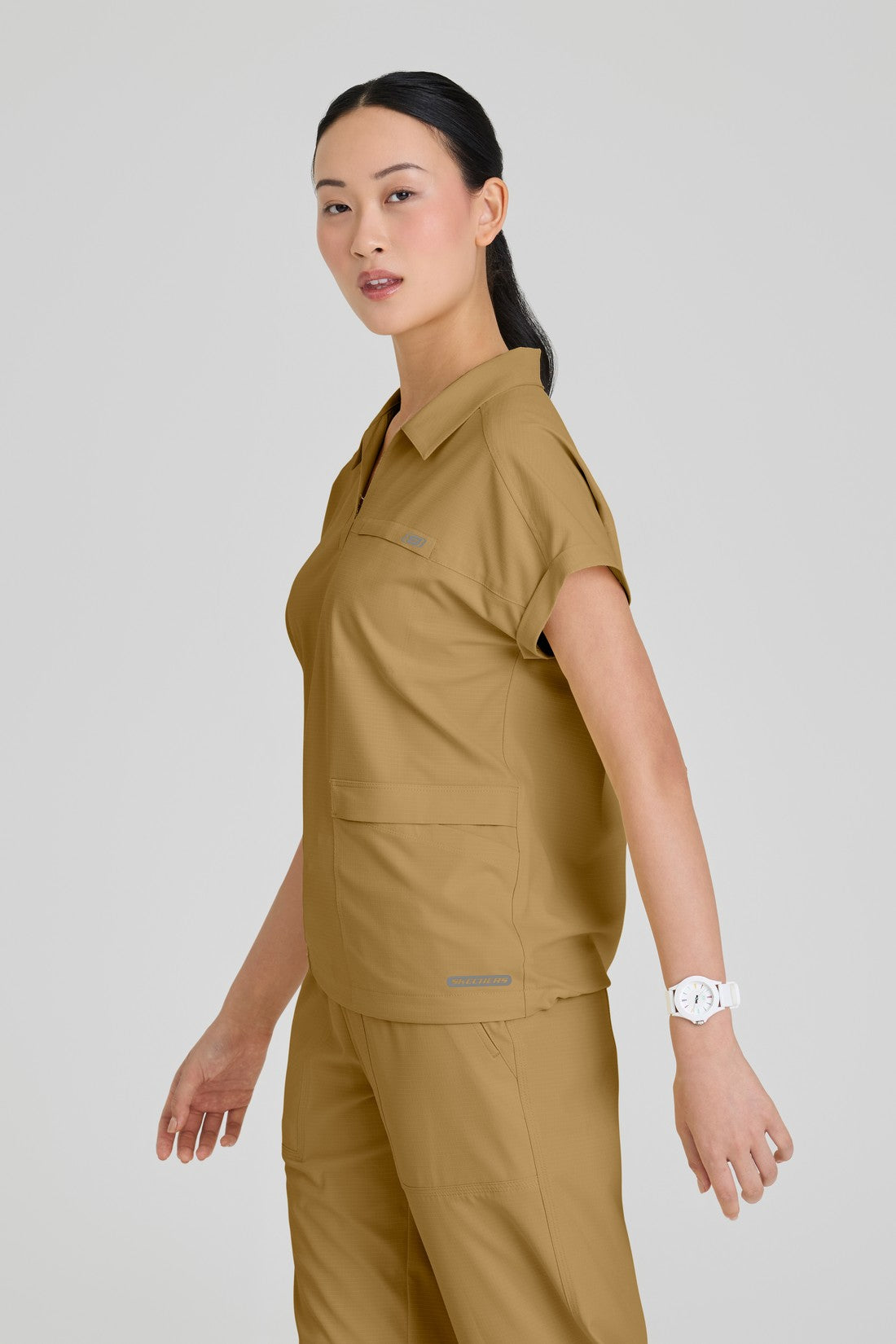 TOP MUJER SKECHERS RIPSTOP SKT276 - BRONCE