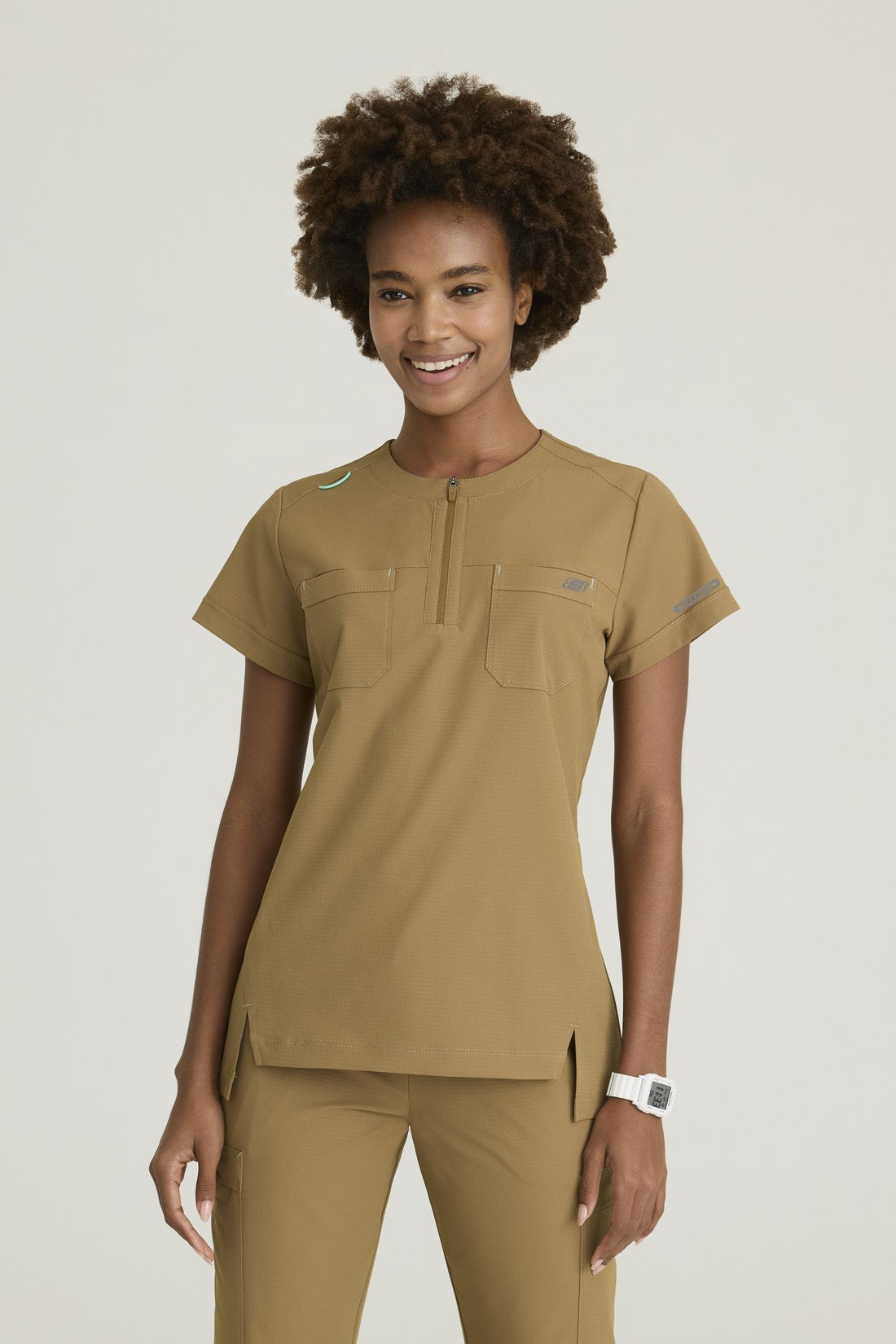 TOP MUJER SKECHERS RIPSTOP SKT284 - BRONCE