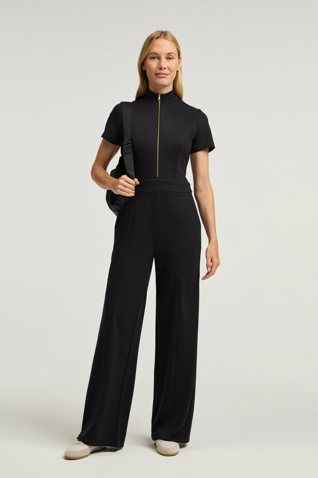 The UltraSOFT® Scrub Jumpsuit - Black + Gold Zip